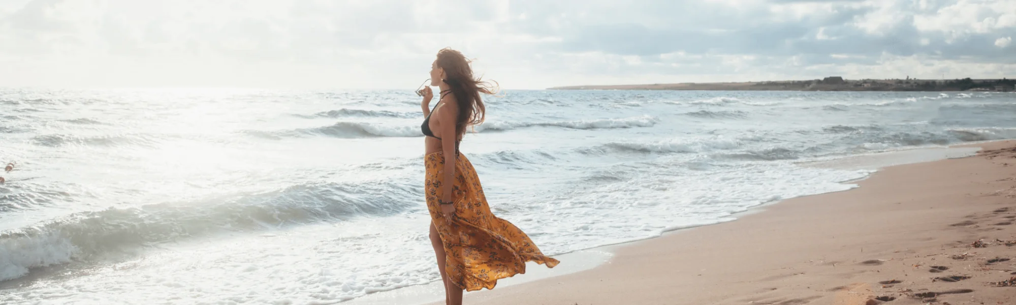 Woman journaling with tea